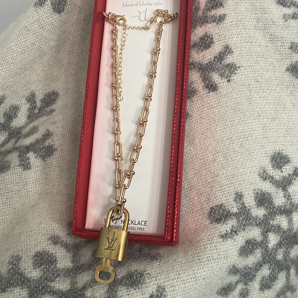 LOUIS VUITTON LOCK AND KEY and a HOUSE OF HARLOW 1960 necklace. 16" + 3"
